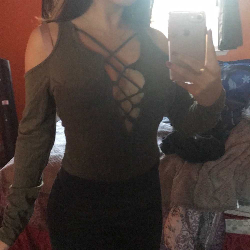 One piece , long sleeve green strappy front